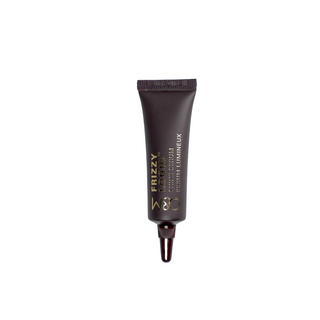 Black tube of Frizzy Lumineux hair serum on a white background